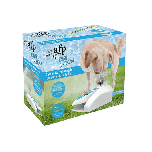 White background with a All for Paws Garden Water Fountain in a box with a dog pictured on the box pushing the fountain to get water.