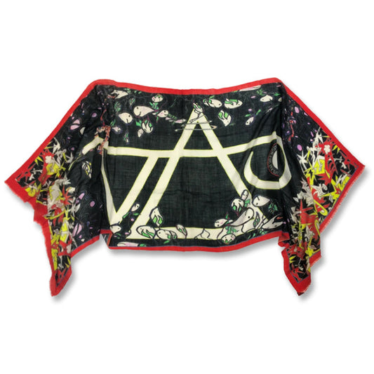 Image of the steve vai art scarf against white background. the scarf is outlined in orange and the center features a large white steve vai logo. The steve vai logo makes the word "vai" with an upside down triangle, a right side up one, and a line going across the triangles with a curl at the end next to the triangle that is upright.  around this are colorful abstract designs in the colors orange, white, yellow, green, and black.