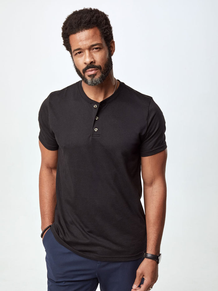 Jarrett is 6', 168lbs and wears a size M # Black Short Sleeve Henleys for Men | Find Your Perfect Size
