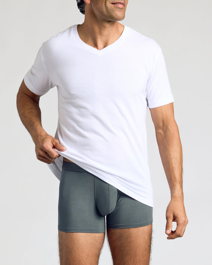 Man wearing Carbon Boxer Trunks 6-Pack, showcasing waistband and fit.