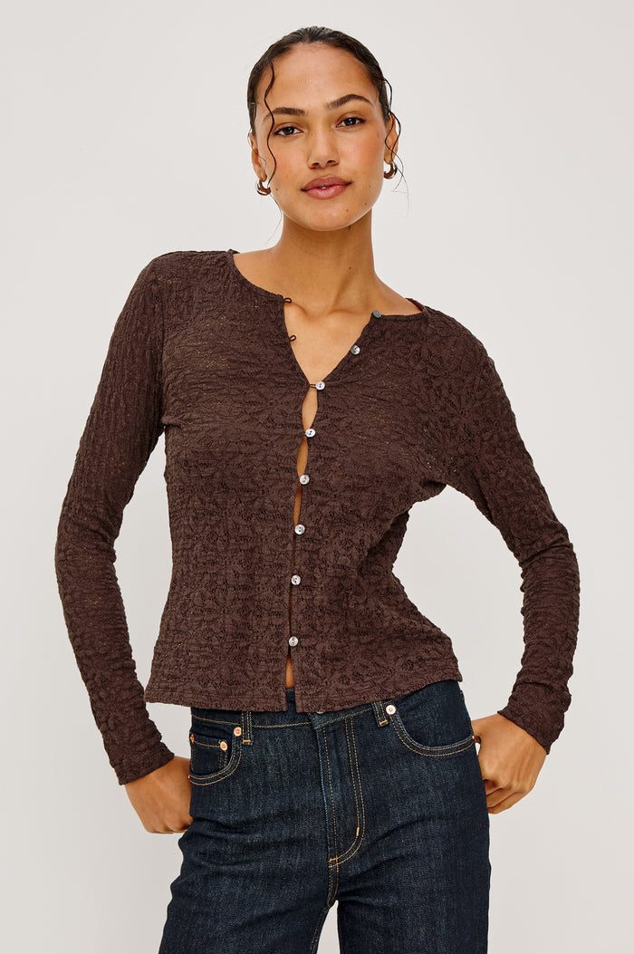 Cyrah Cardigan in Sheer Stretch Lace With Fitted Long Sleeves, and Front Button-and-Loop Closures in Walnut Colorway - Upper Body Front View Featured on Model