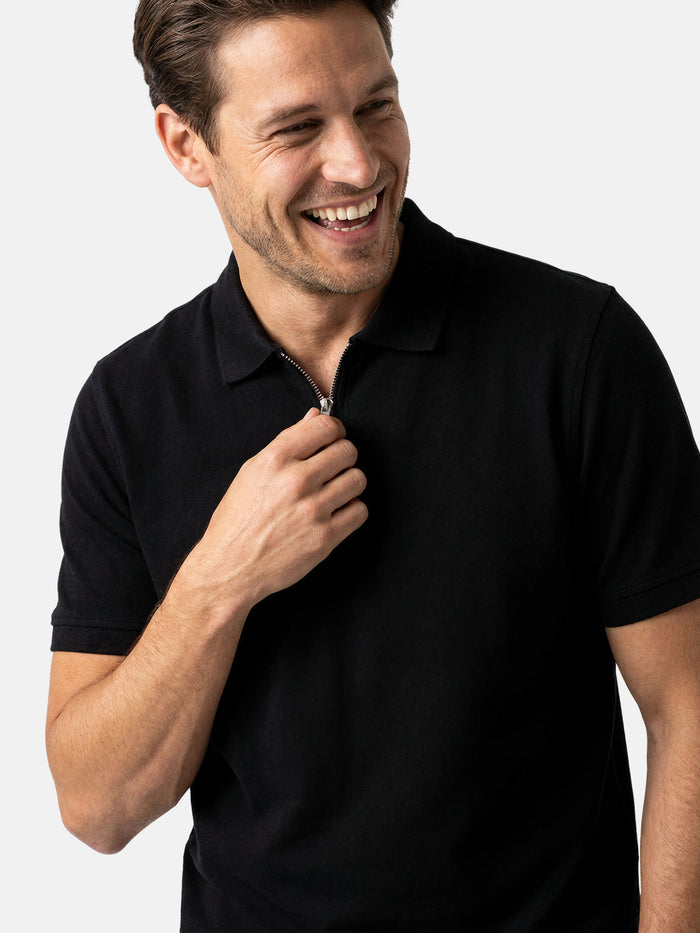 Close-up of black zip polo t-shirt, men’s slim fit smart casual style