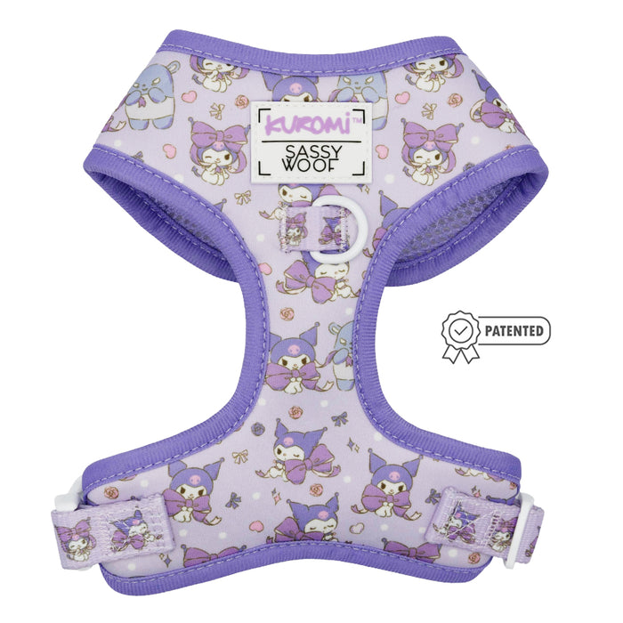The Sassy Woof Dog Adjustable Harness - Kuromi™ features purple Kuromi characters, pastel bows, a patented label, and a white adjustable buckle—a cute and functional choice for stylish pups.