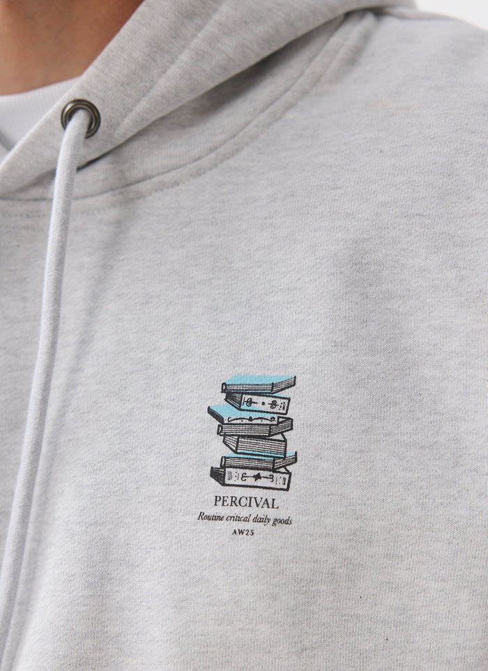 A close-up of the Percival Duke Hoodie in grey, highlighting the 'Routine Critical Daily Goods' book graphic on the chest.