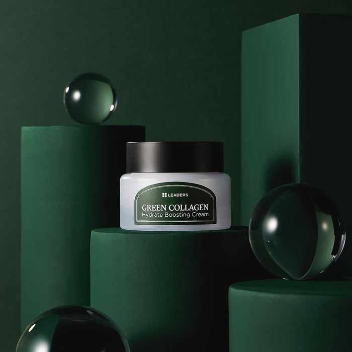 Jar of Green Collagen Firming Hydrate Boosting Cream | Leaders displayed on dark green cylindrical platforms with reflective glass spheres, evoking a sleek skincare aesthetic.