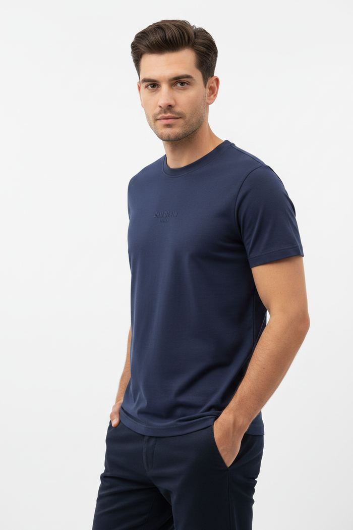 Wam Denim Cromer Navy T-shirt – three-quarter view on model