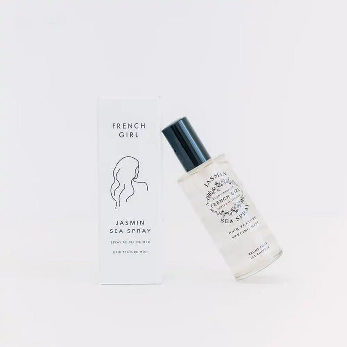 Minimalist bottle and matching box of Jasmin Sea Spray - Hair Texture Mist | French Girl, featuring elegant black and white design with natural botanical accents.