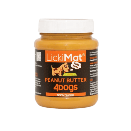 White background with a jar of LickMat Peanut Butter 4Dogs, pictured on the is an illustrated dog with text below '100% Peanuts'
