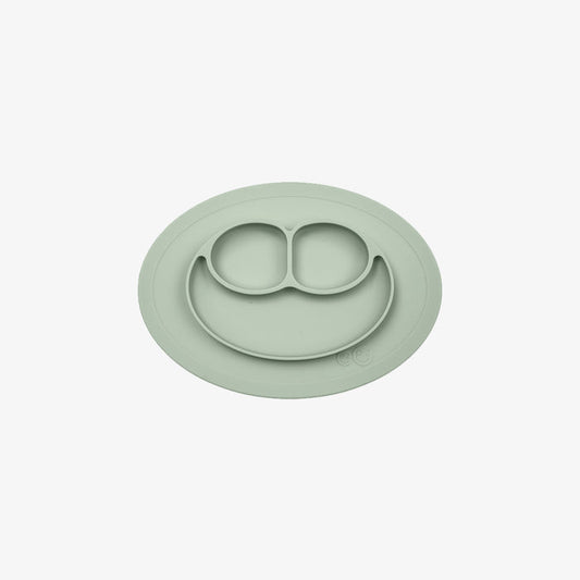 The Mini Mat in Sage Green by ezpz / Self-Suctioning Silicone Plate + Placemat #color_sage