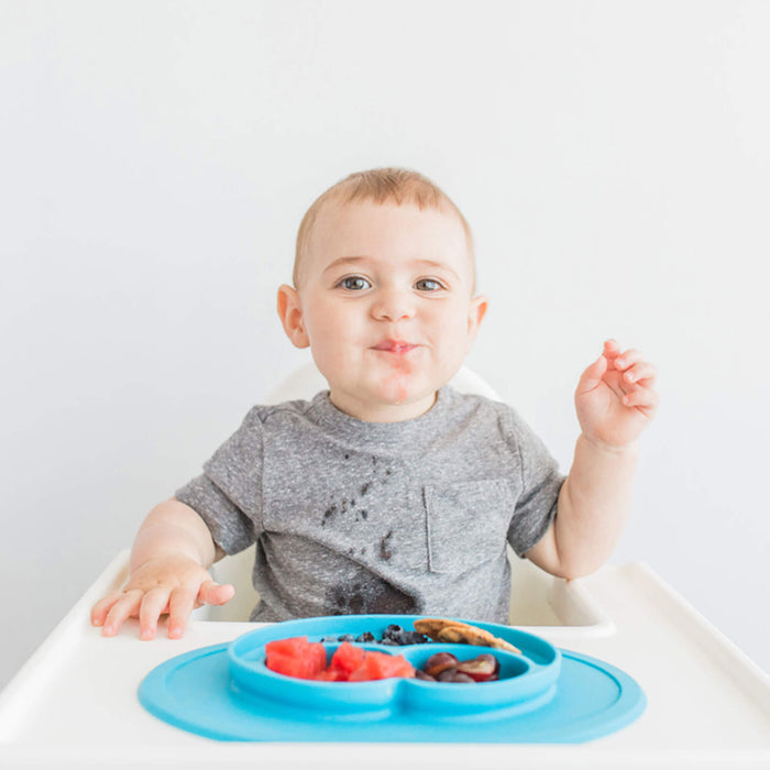 The Mini Mat in Blue by ezpz / Self-Suctioning Silicone Plate + Placemat #color_blue