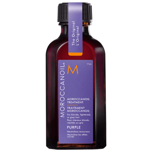 Bottle of Moroccanoil Treatment Purple | Moroccanoil with a purple label designed for blonde, lightened, or grey hair to neutralize brassiness.