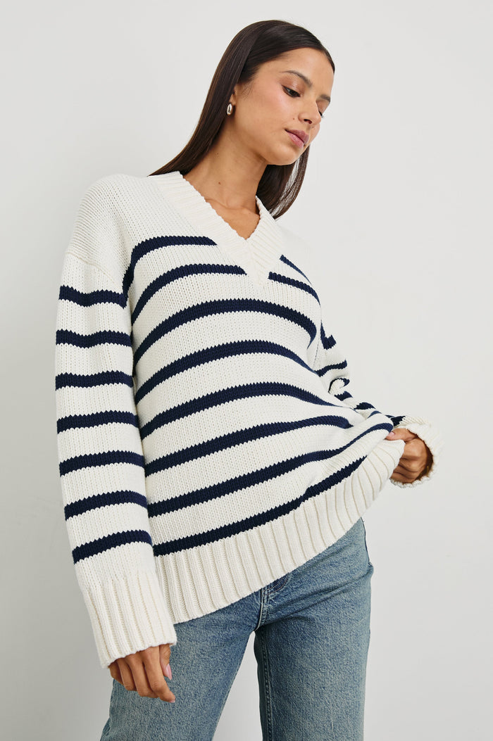 Penny Long-Sleeve, V Neck Sweater with Ribbed Trim in Ivory Navy Stripe Colorway, Horizontal Stripes - Front View Featured on Model