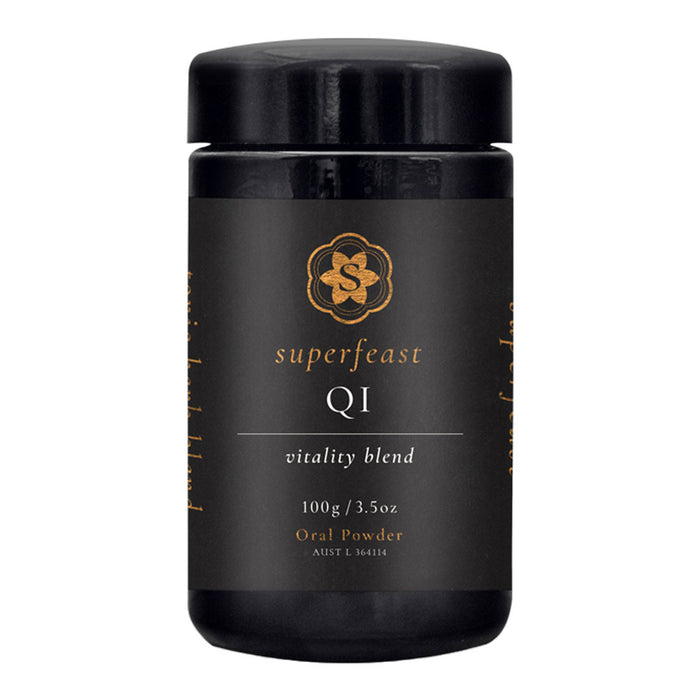 Black container of Superfeast Q1 vitality blend on a white background