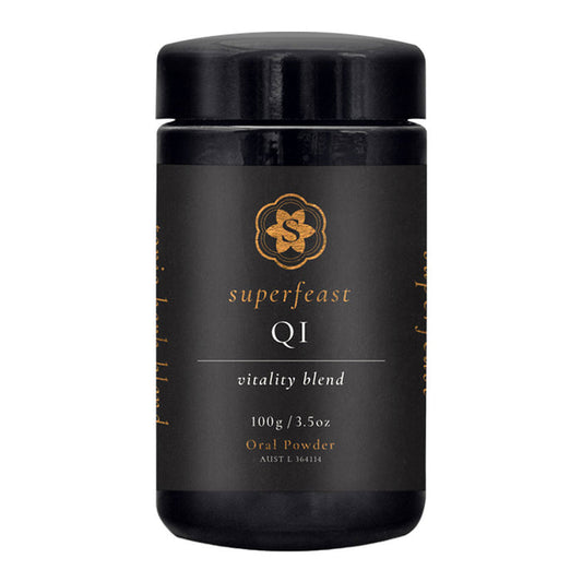 Black container of Superfeast Q1 vitality blend on a white background
