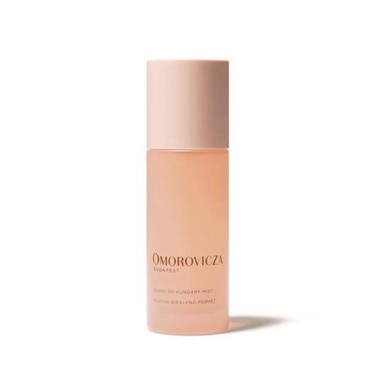 Queen of Hungary Mist | Omorovicza in a sleek frosted pink bottle designed for skincare and refreshing facial mist applications.