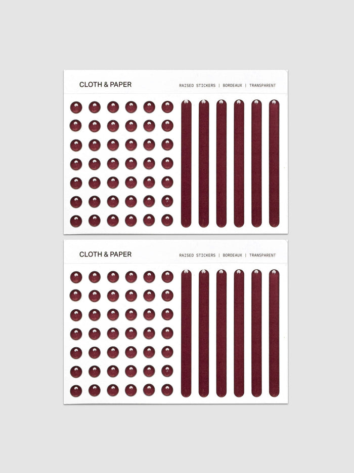 Four sheets from the Raised Sticker Set in the color Bordeaux (burgundy).