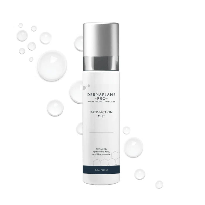 Bottle of Satisfaction Mist | DermaplanePro professional skincare spray with aloe, hyaluronic acid, and niacinamide, surrounded by water droplets on a white background.