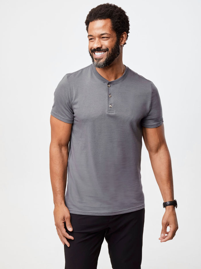 Jarrett is 6', 168lbs and wears a size M # Men's Slate Short Sleeve Henley | Fresh Clean Threads