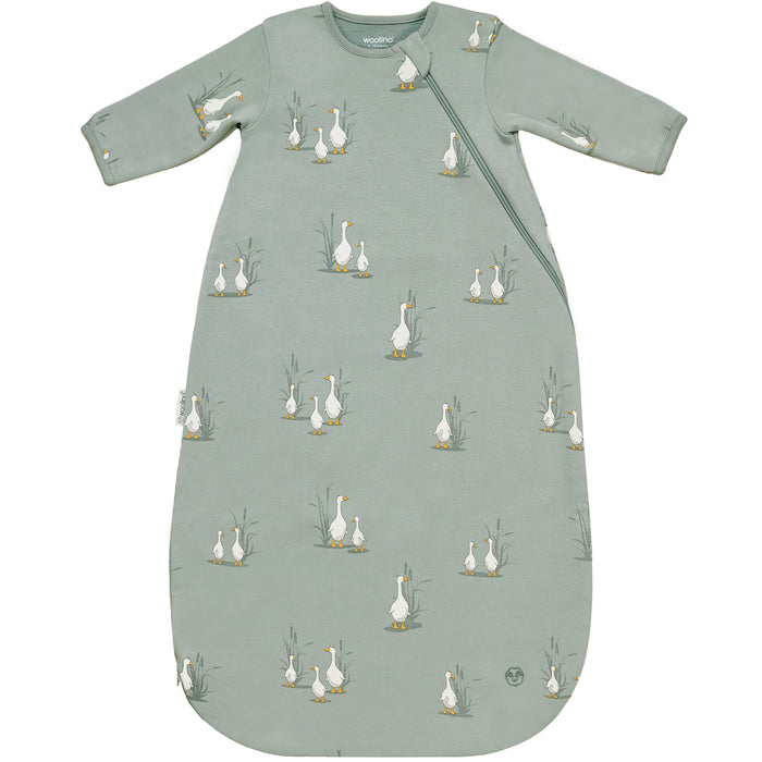 Green baby sleeping bag with long sleeves with a duck pattern on a white background