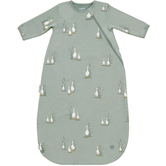 Green baby sleeping bag with long sleeves with a duck pattern on a white background