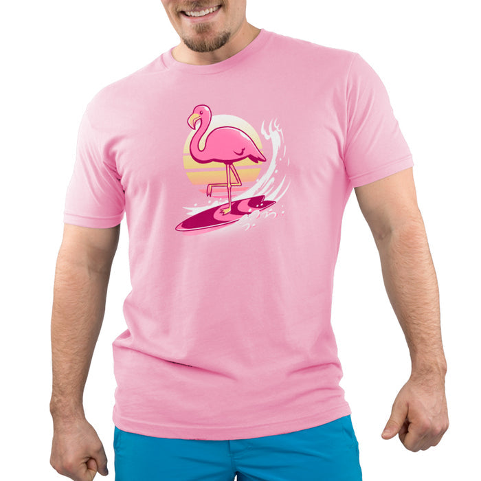 Premium Cotton T-shirt_TeeTurtle light pink Surfing Flamingo apparel featuring a flamingo on a surfboard with a sunset behind.
