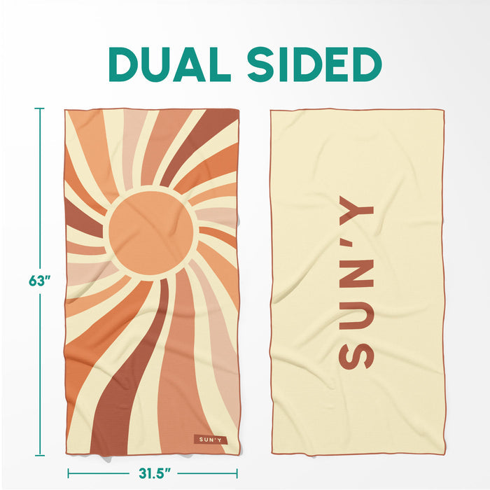 Waffle Microfiber Beach Towel - Rays | SUN'Y showing dual-sided design with sunray pattern on one side and cream color with SUN'Y branding on the other, measuring 63 by 31.5 inches.