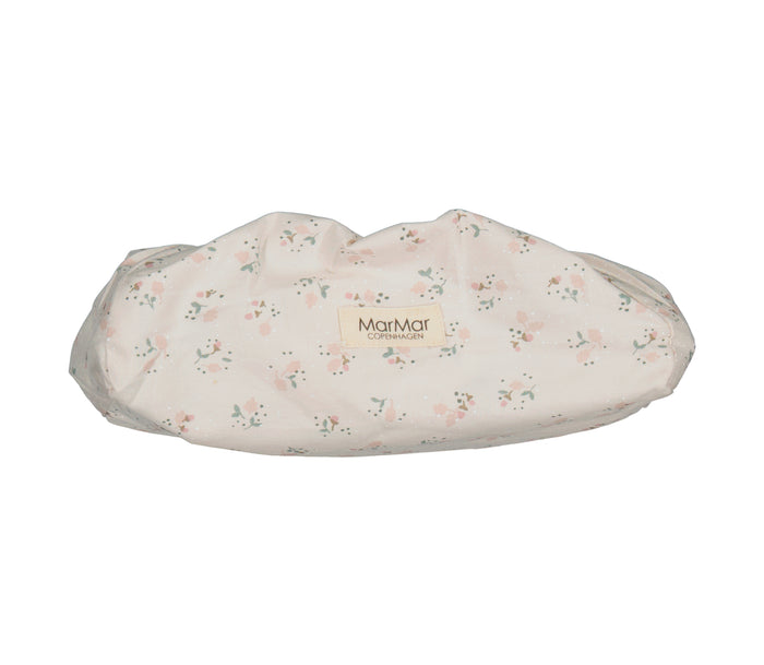 Vådservietovertræk i lyse beige med små blomster, elastisk kant og MarMar-logo