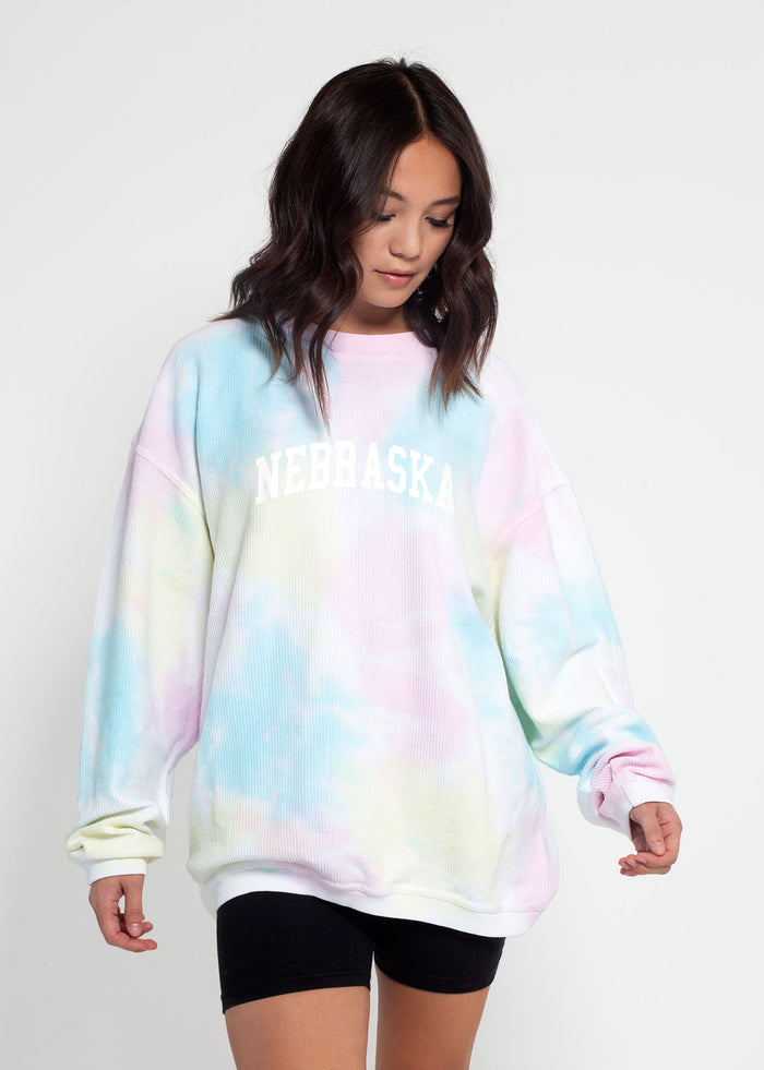 Nebraska Cornhuskers Unisex Rainbow-Tie-Dye Oversized Premium cotton corded fleece Sweatshirt with Super soft hand feel, vintage wash and ribbed crew neckline, cuffs, and hemline